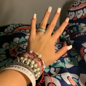 green and silver ring